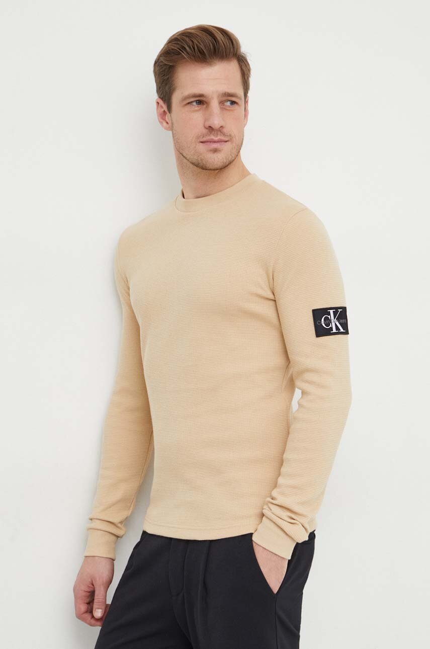 

Памучен суичър Calvin Klein Jeans в бежово с апликация, Бежов
