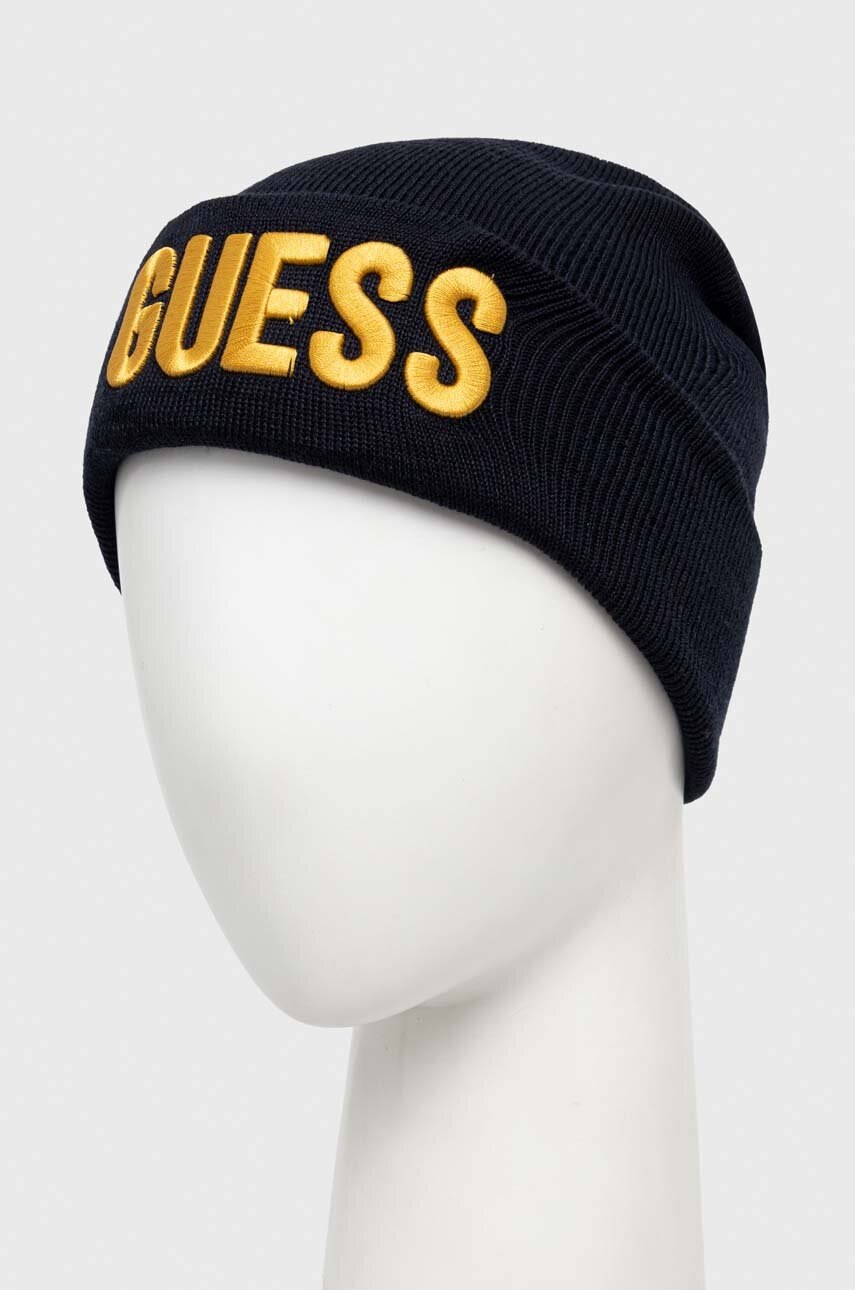 Дитяча шапка Guess колір синій з тонкого трикотажу Дитяча шапка Guess колір синій з тонкого трикотажу