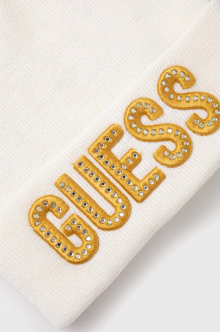 Дитяча шапка Guess колір білий з тонкого трикотажу Дитяча шапка Guess колір білий з тонкого трикотажу