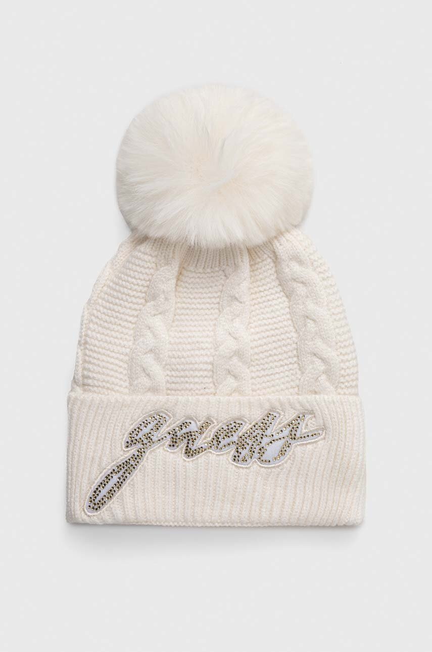 

Дитяча шапка Guess колір бежевий з товстого трикотажу