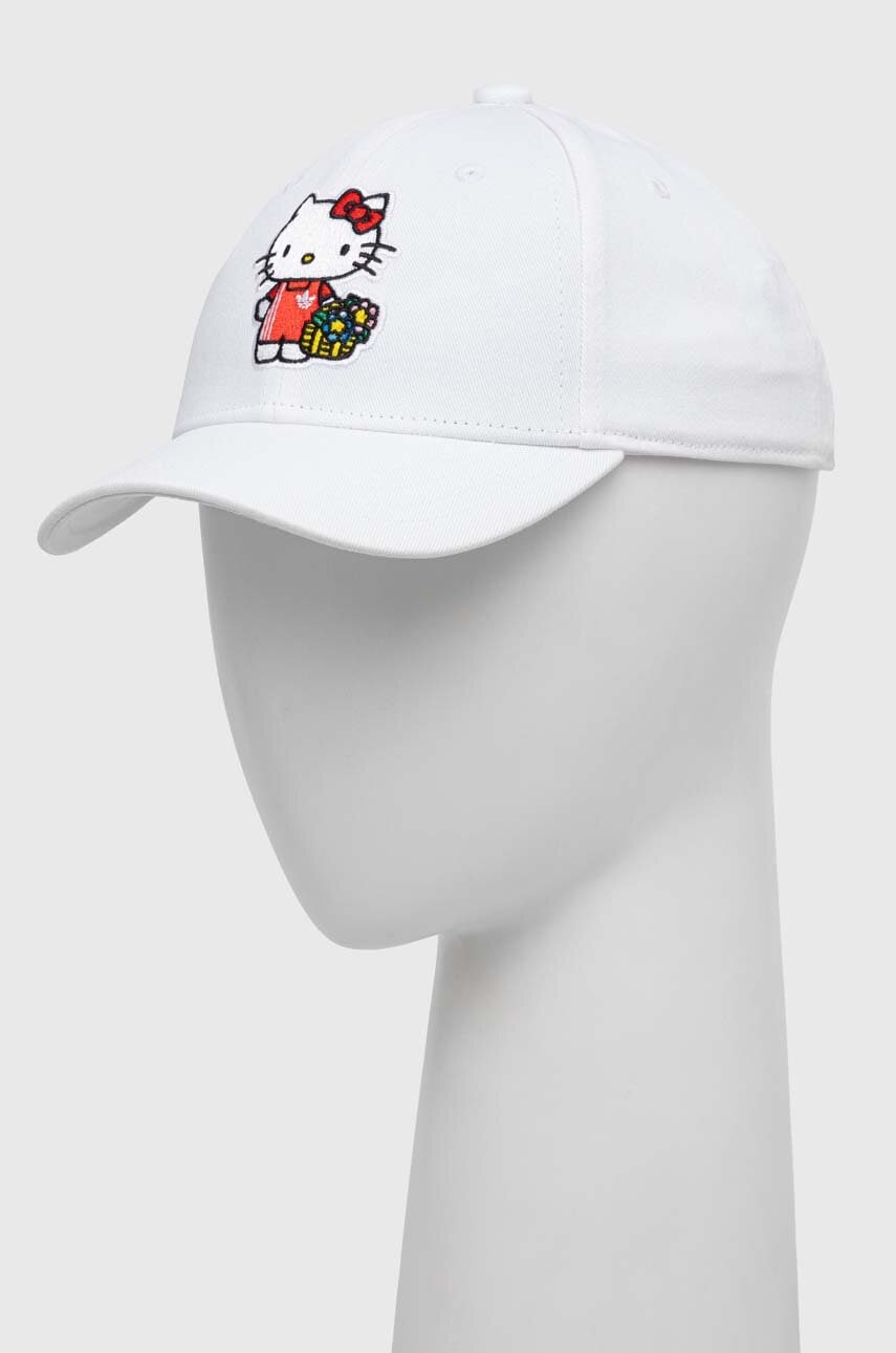 Levně Dětská bavlněná kšiltovka adidas Originals x Hello Kitty bílá barva, s aplikací