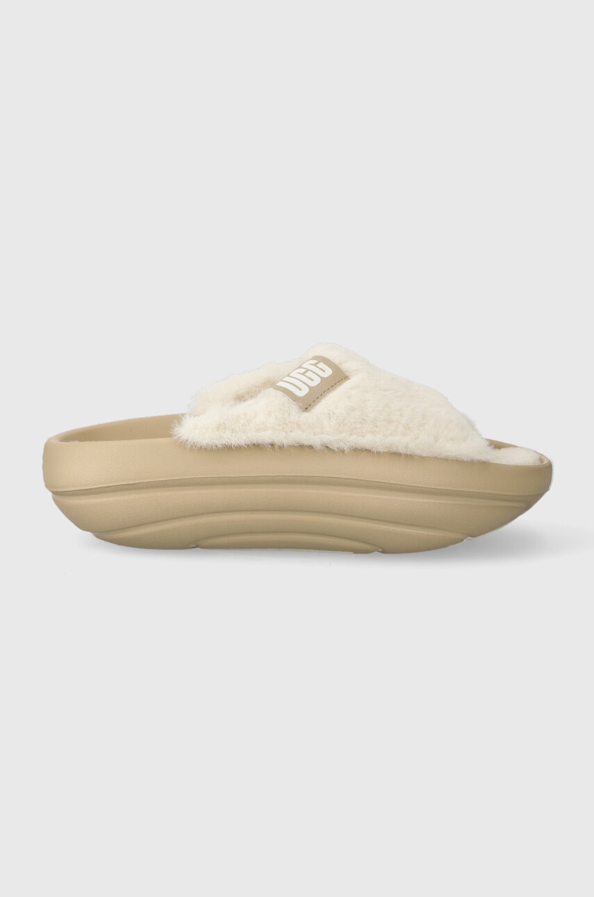 

Шлепанцы UGG Foamo Uggplush Slide женские цвет бежевый на платформе 1143849