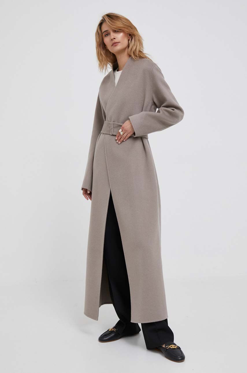 Vlněný kabát Calvin Klein béžová barva, přechodný, bez zapínání - béžová -  70 % Vlna