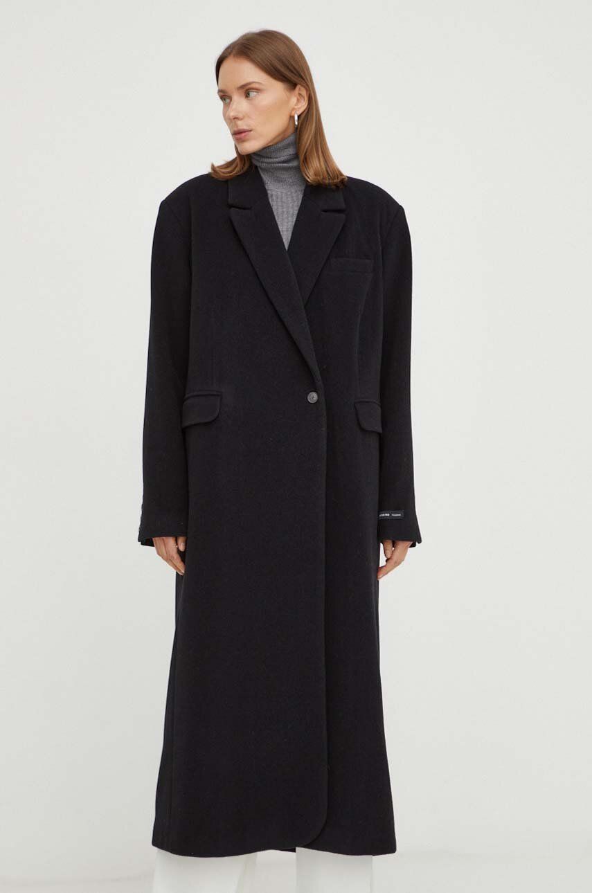 Vlněný kabát Herskind Wanda černá barva, přechodný, oversize - černá - Hlavní materiál: 70 % Recyklo