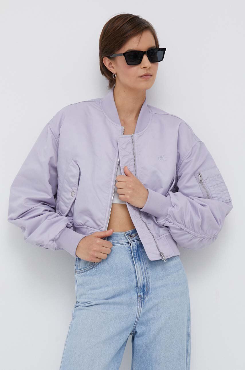 Levně Bomber bunda Calvin Klein Jeans fialová barva, přechodná