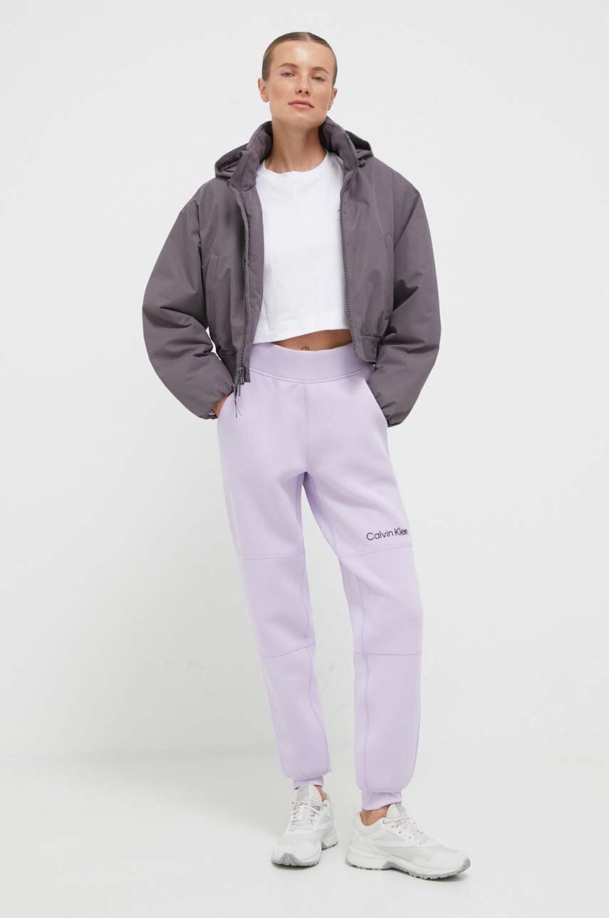 Levně Sportovní bunda Calvin Klein Performance fialová barva, oversize