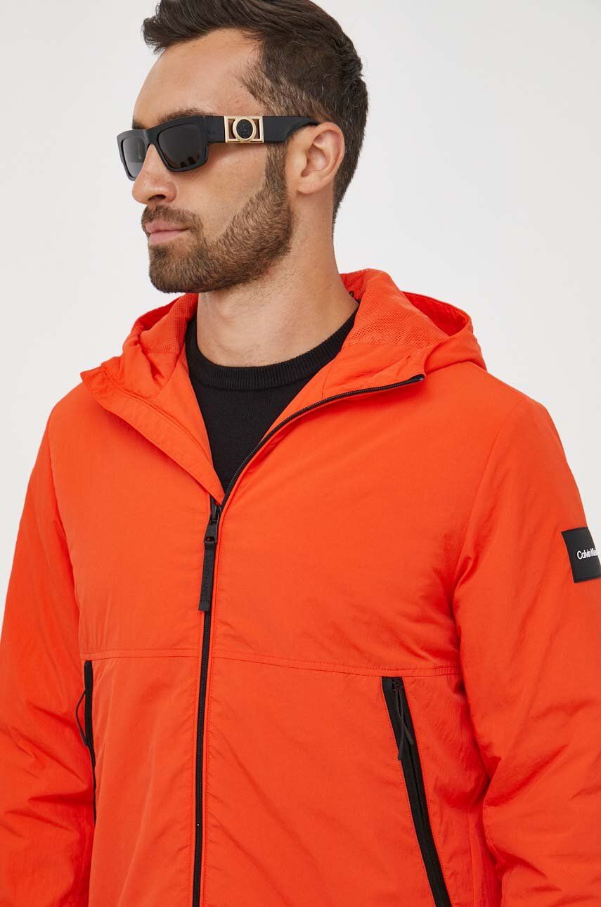 Bunda Calvin Klein pánská, oranžová barva, přechodná - oranžová -  Hlavní materiál: 100 % Polya
