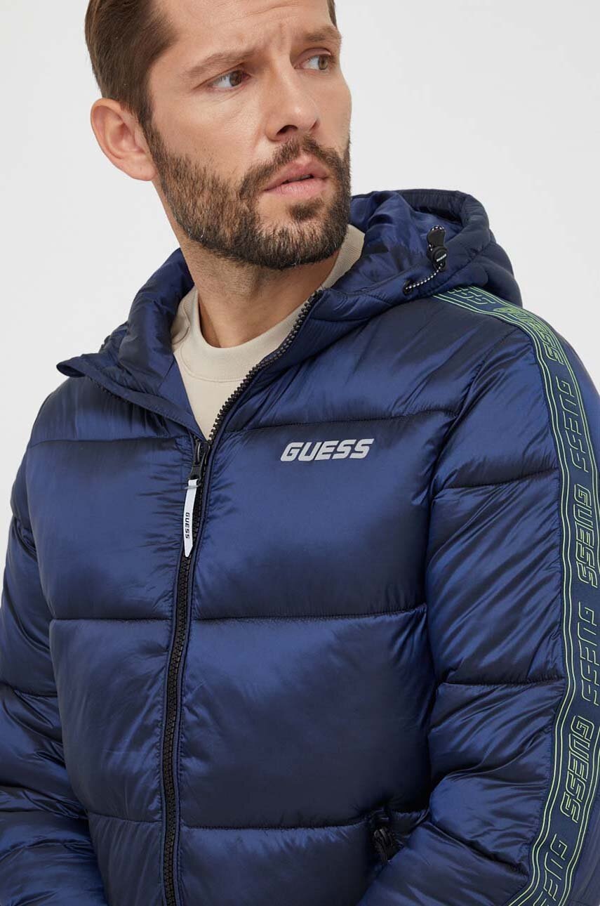 

Куртка Guess чоловіча колір синій зимова