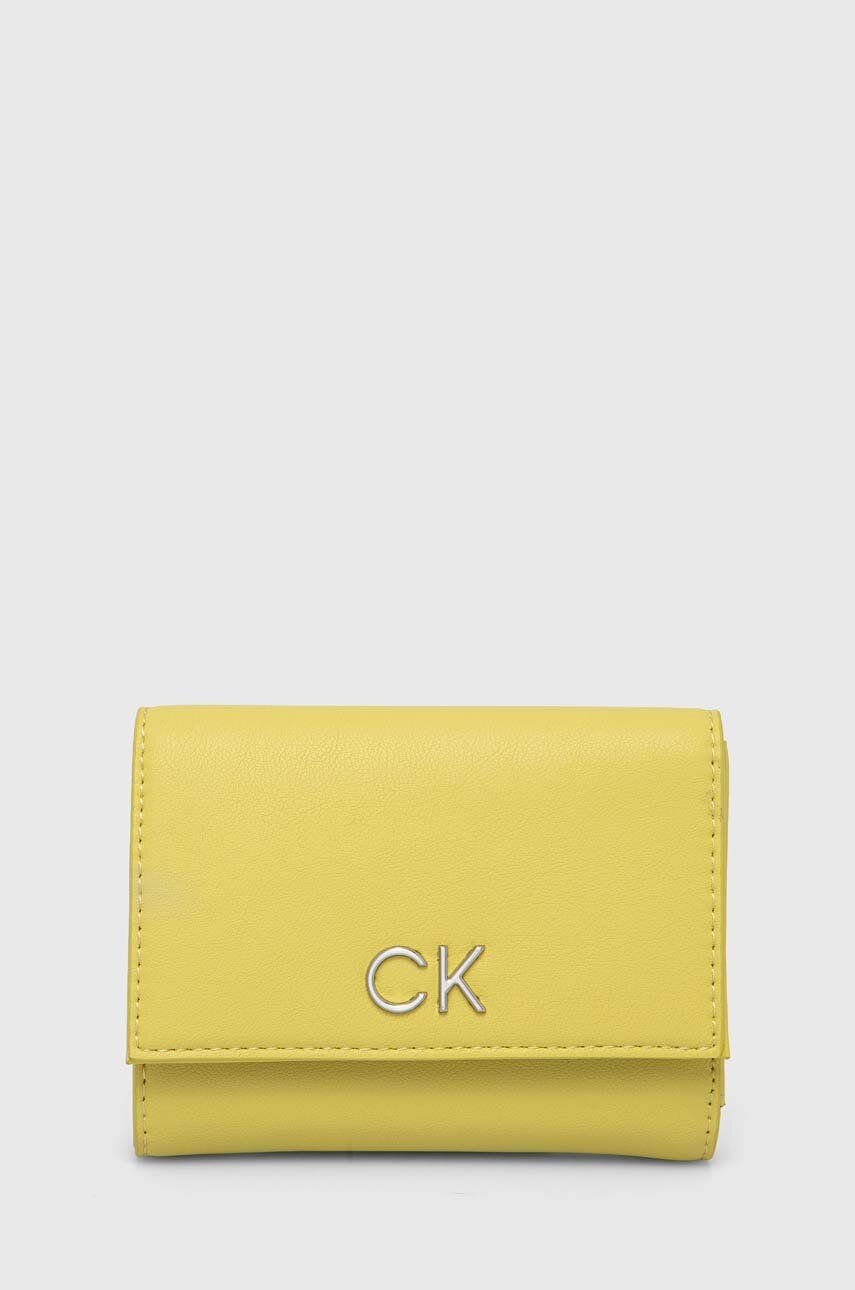 Levně Peněženka Calvin Klein žlutá barva, K60K608994