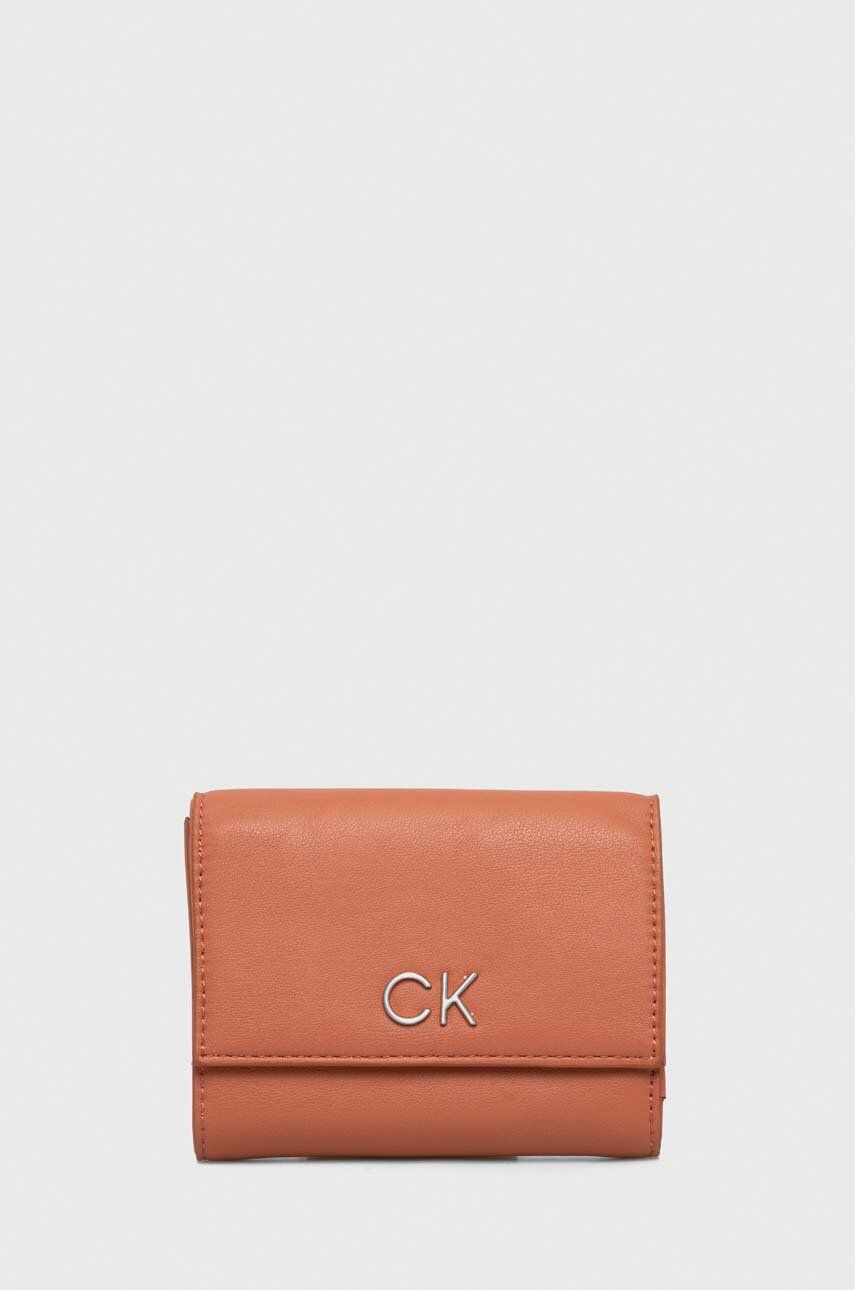 Peněženka Calvin Klein oranžová barva, K60K608994