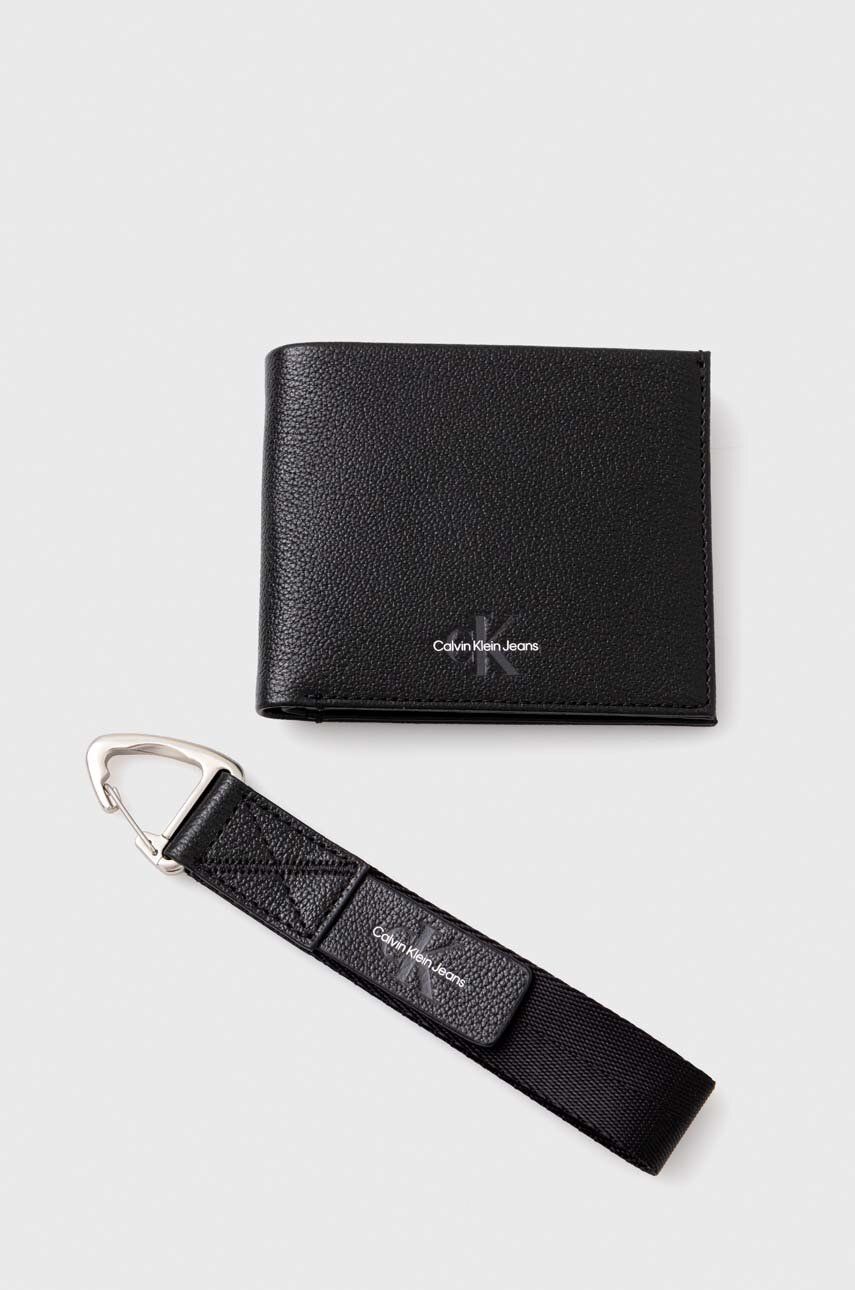 Levně Kožená peněženka Calvin Klein Jeans černá barva