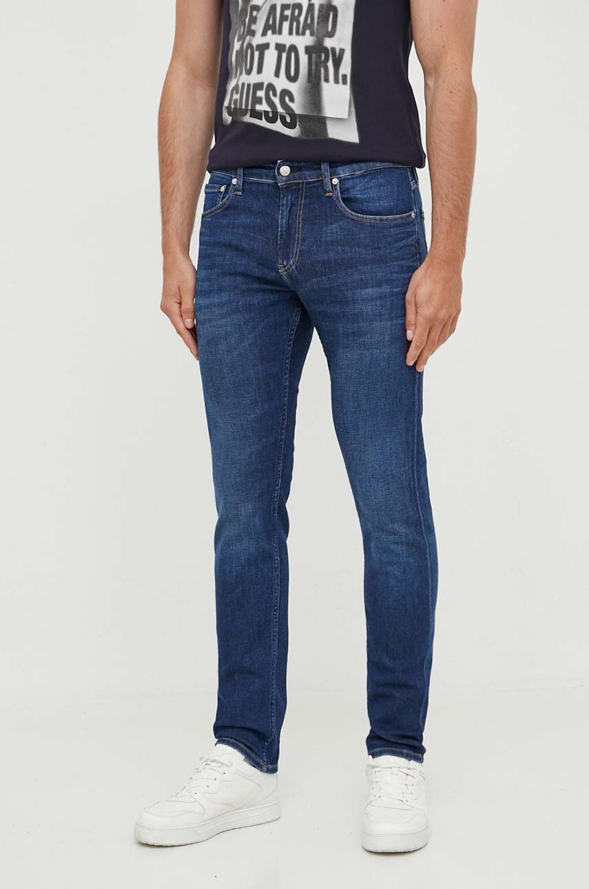 Džíny Calvin Klein Jeans pánské, tmavomodrá barva - námořnická modř -  69 % Bavlna