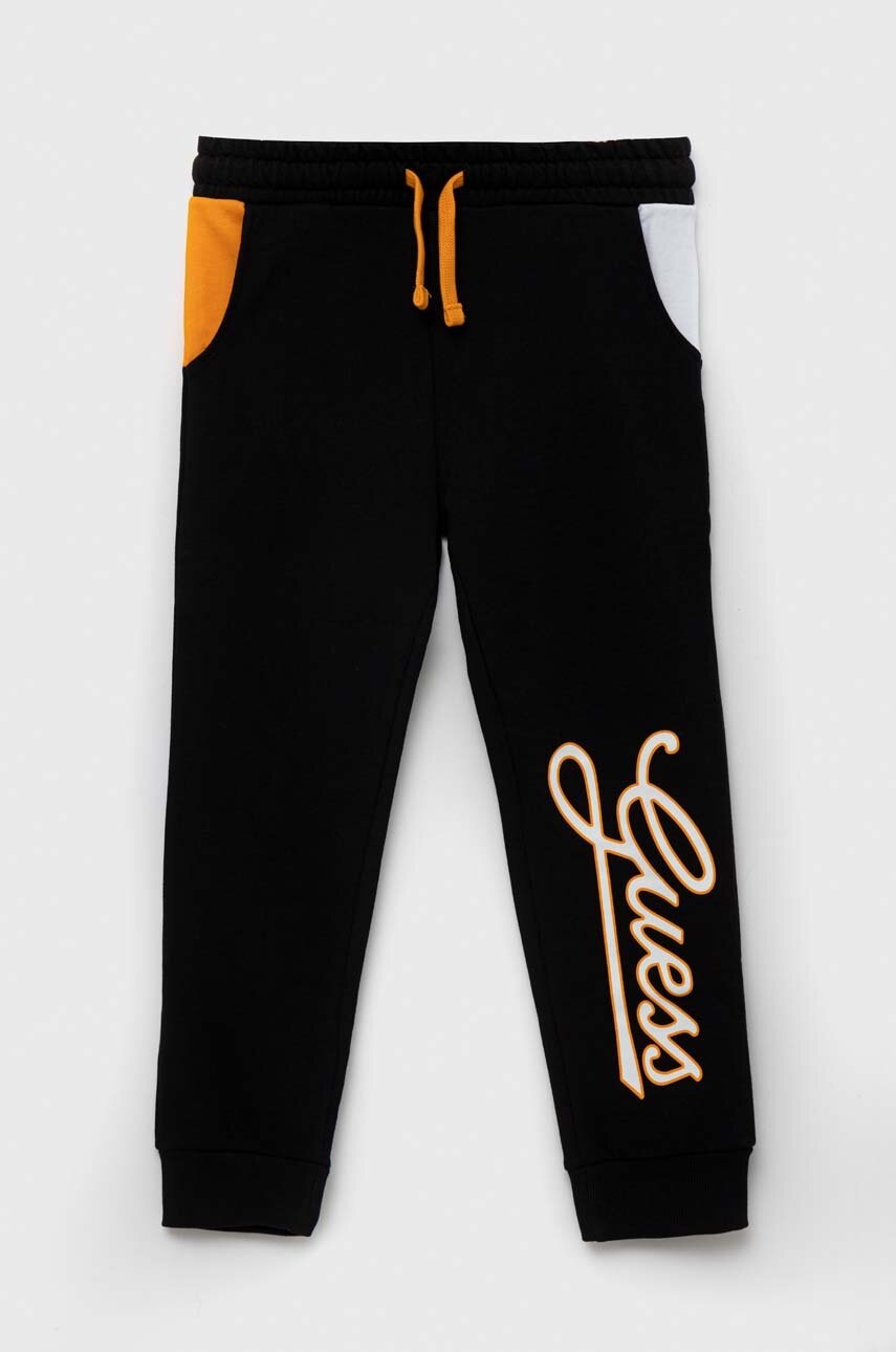 Детские хлопковые штаны Guess цвет чёрный с узором Детские хлопковые штаны Guess цвет чёрный с узором