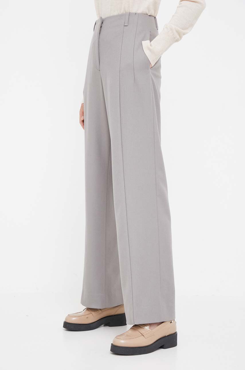 Levně Vlněné kalhoty Calvin Klein šedá barva, jednoduché, high waist