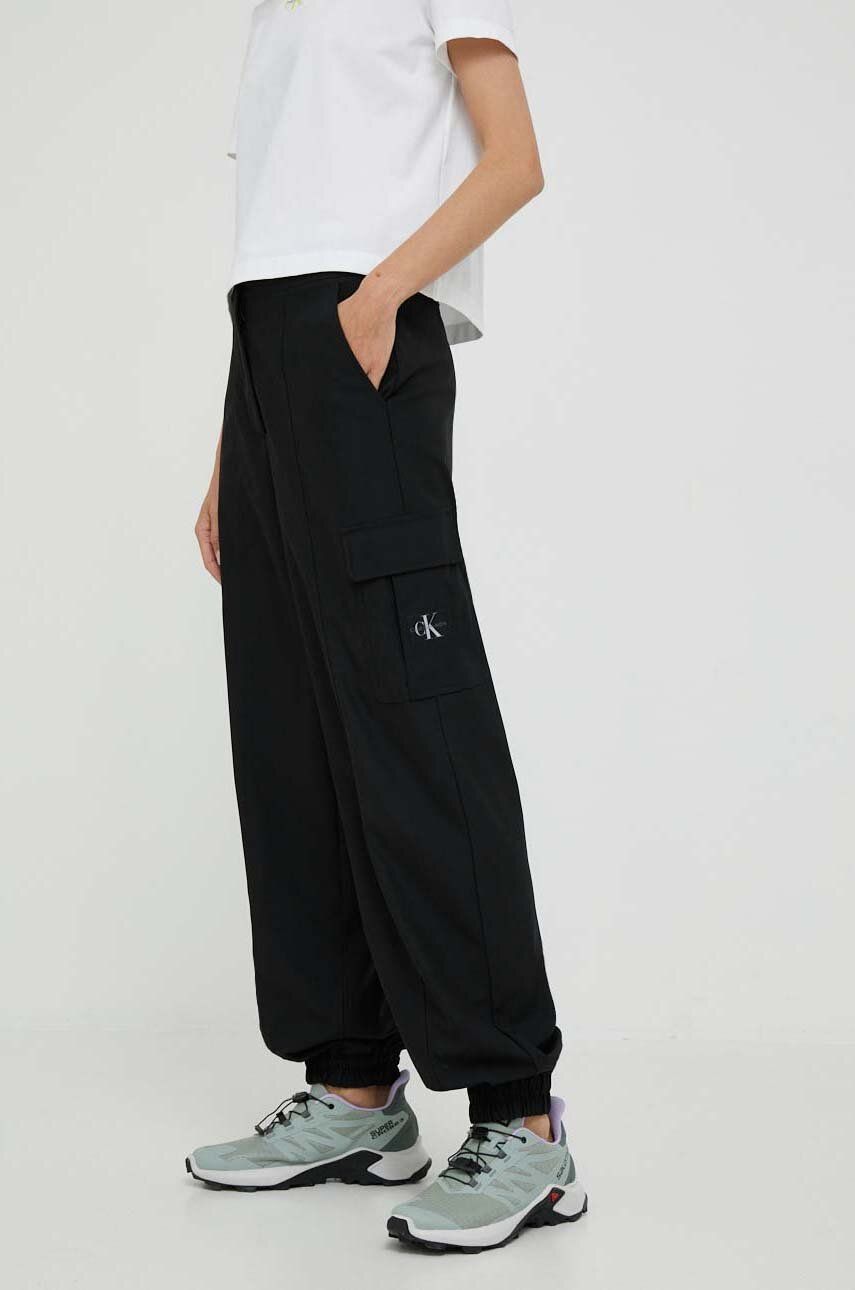 Levně Kalhoty Calvin Klein Jeans dámské, černá barva, široké, high waist