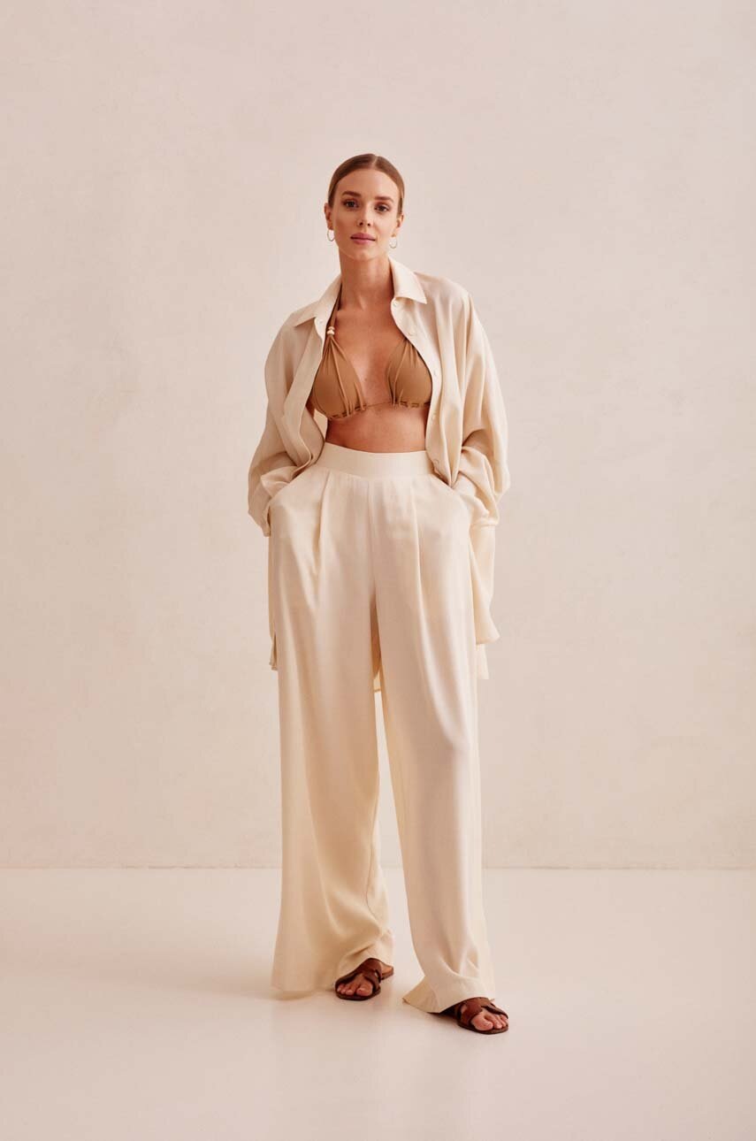

Брюки Praia Beachwear COMO женские цвет бежевый широкие высокая посадка