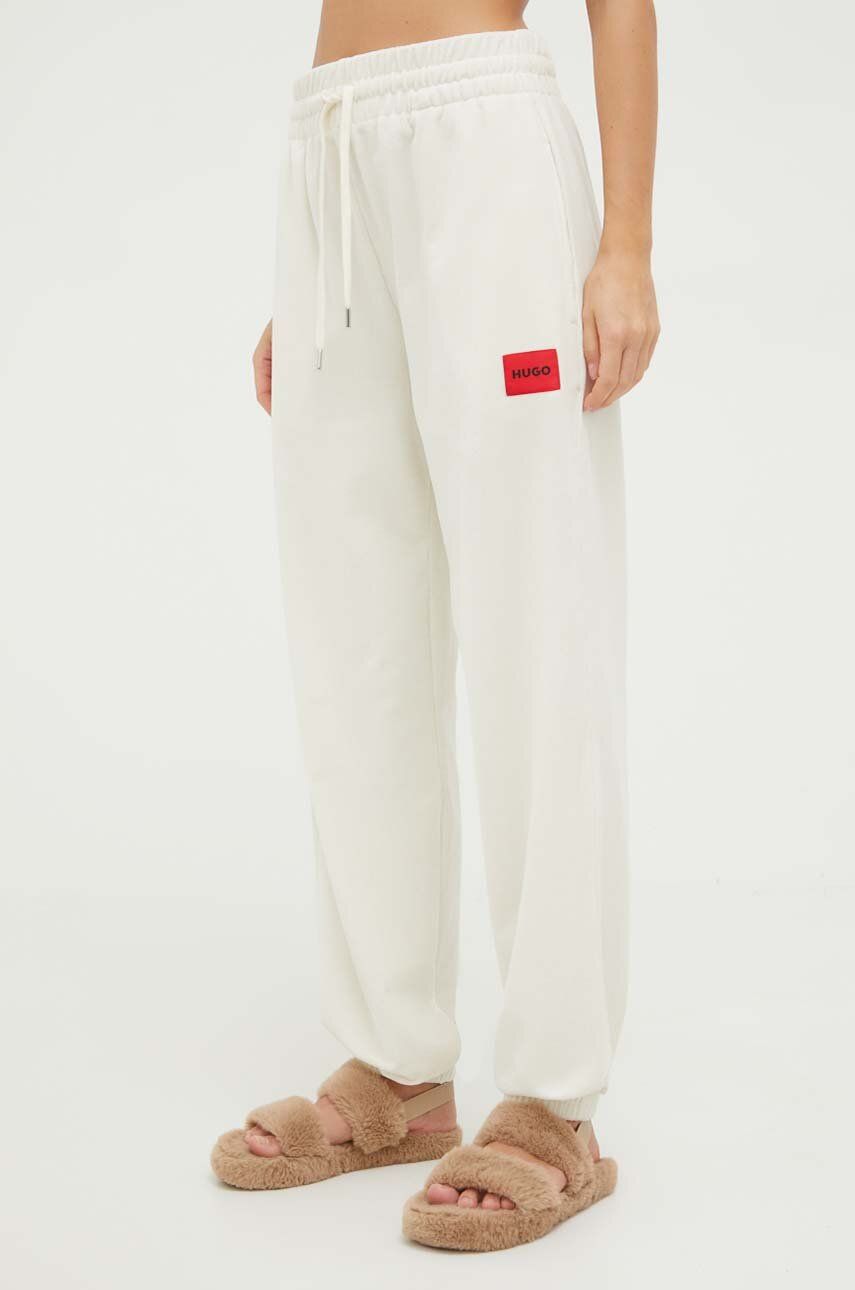 Kalhoty HUGO béžová barva - béžová - 68 % Bavlna