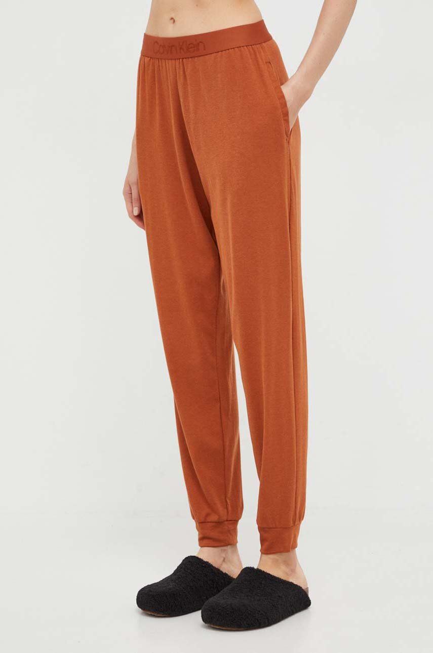 Levně Pyžamové kalhoty Calvin Klein Underwear dámské, oranžová barva