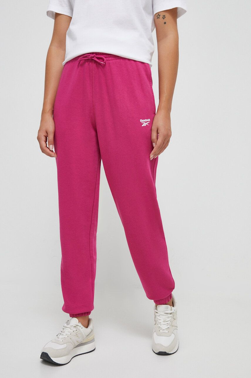 Reebok pantaloni de trening culoarea roz, neted