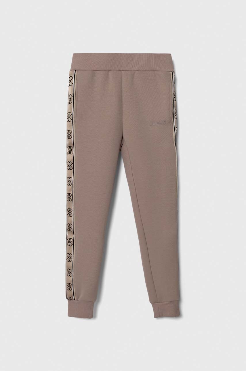 Dětské tepláky Guess hnědá barva, vzorované