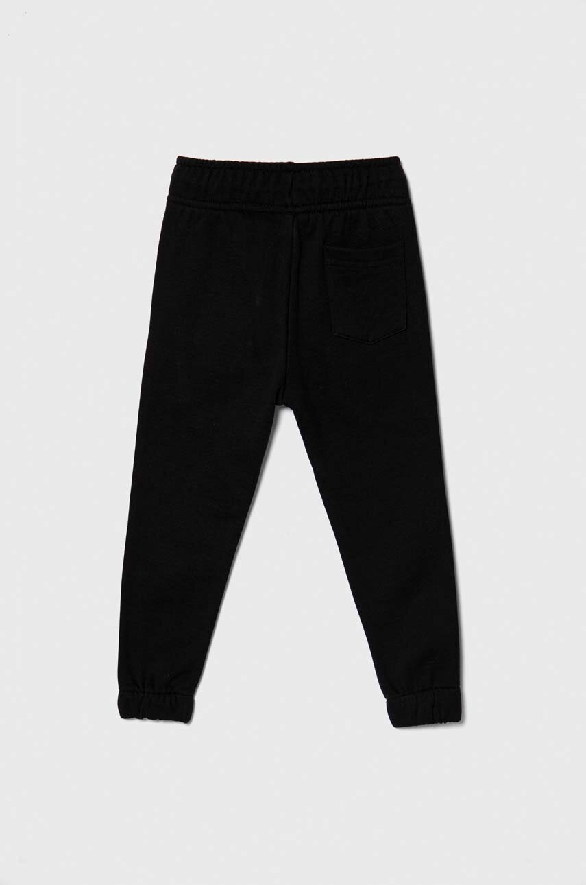 Детские хлопковые штаны HUGO цвет чёрный с принтом