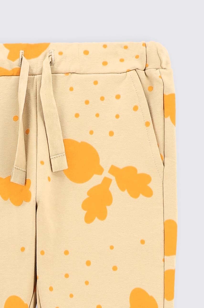 Дитячі спортивні штани Coccodrillo колір бежевий візерунок в Чернівцях Дитячі спортивні штани Coccodrillo колір бежевий візерунок в Чернівцях