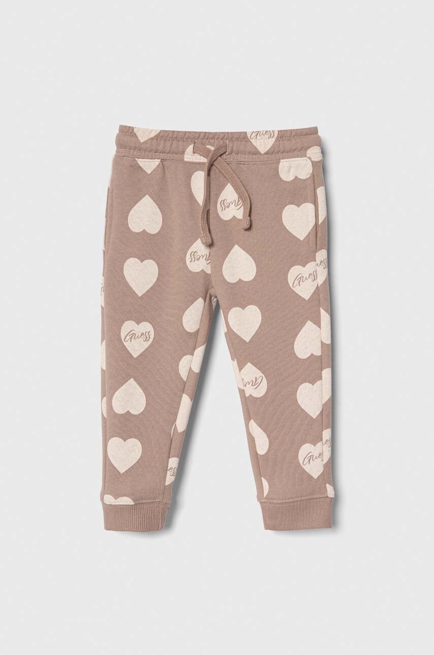 Дитячі спортивні штани Guess колір коричневий візерунок Дитячі спортивні штани Guess колір коричневий візерунок