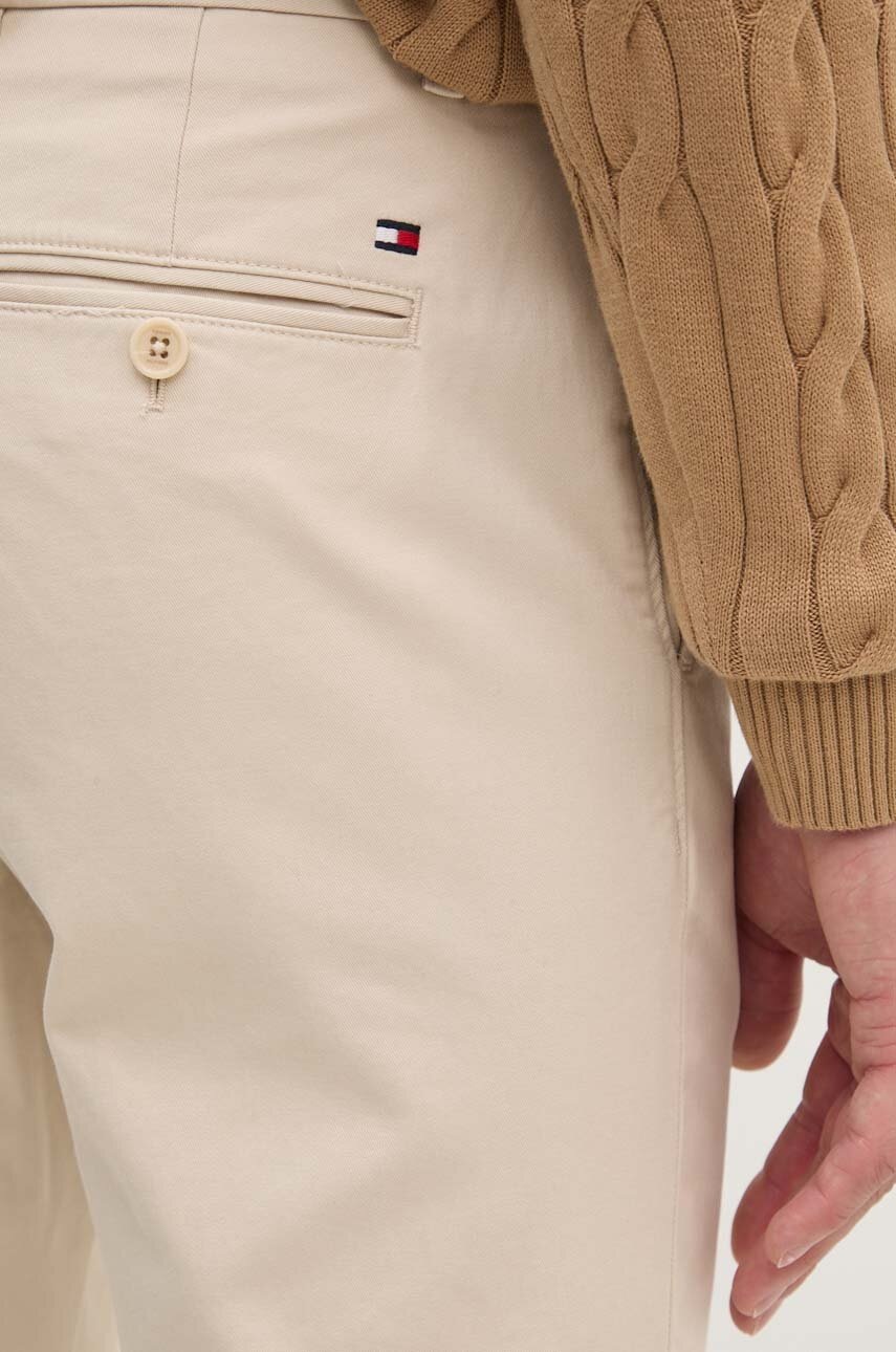 Штани Tommy Hilfiger чоловічі колір бежевий облягаючі MW0MW26619 