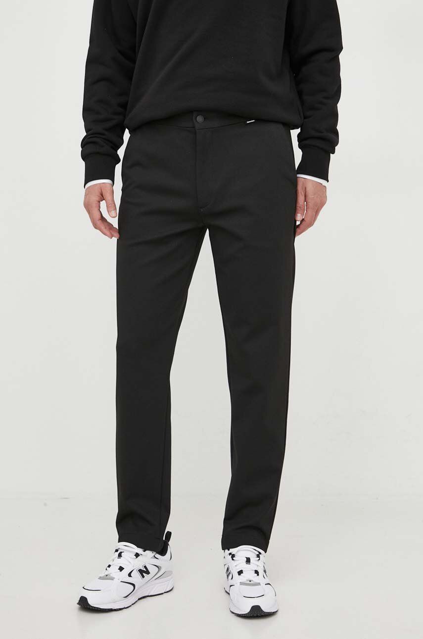 Levně Kalhoty Calvin Klein pánské, černá barva, přiléhavé, K10K111793