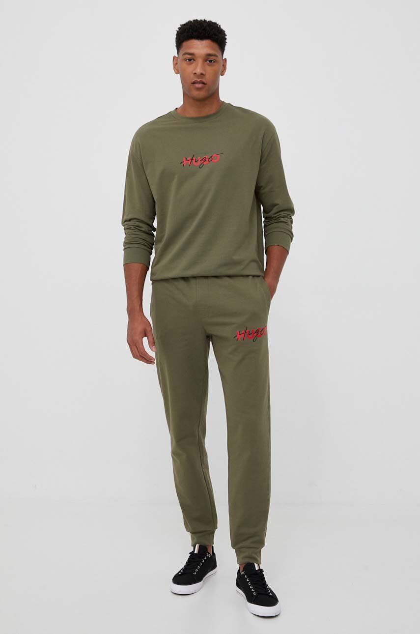 E-shop Bavlněné kalhoty HUGO zelená barva, s potiskem