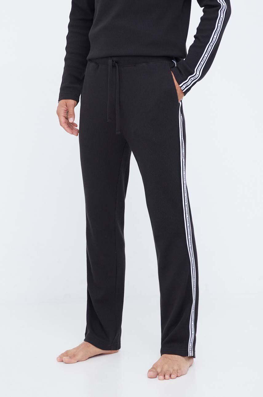 Levně Bavlněné kalhoty Michael Kors černá barva, s aplikací
