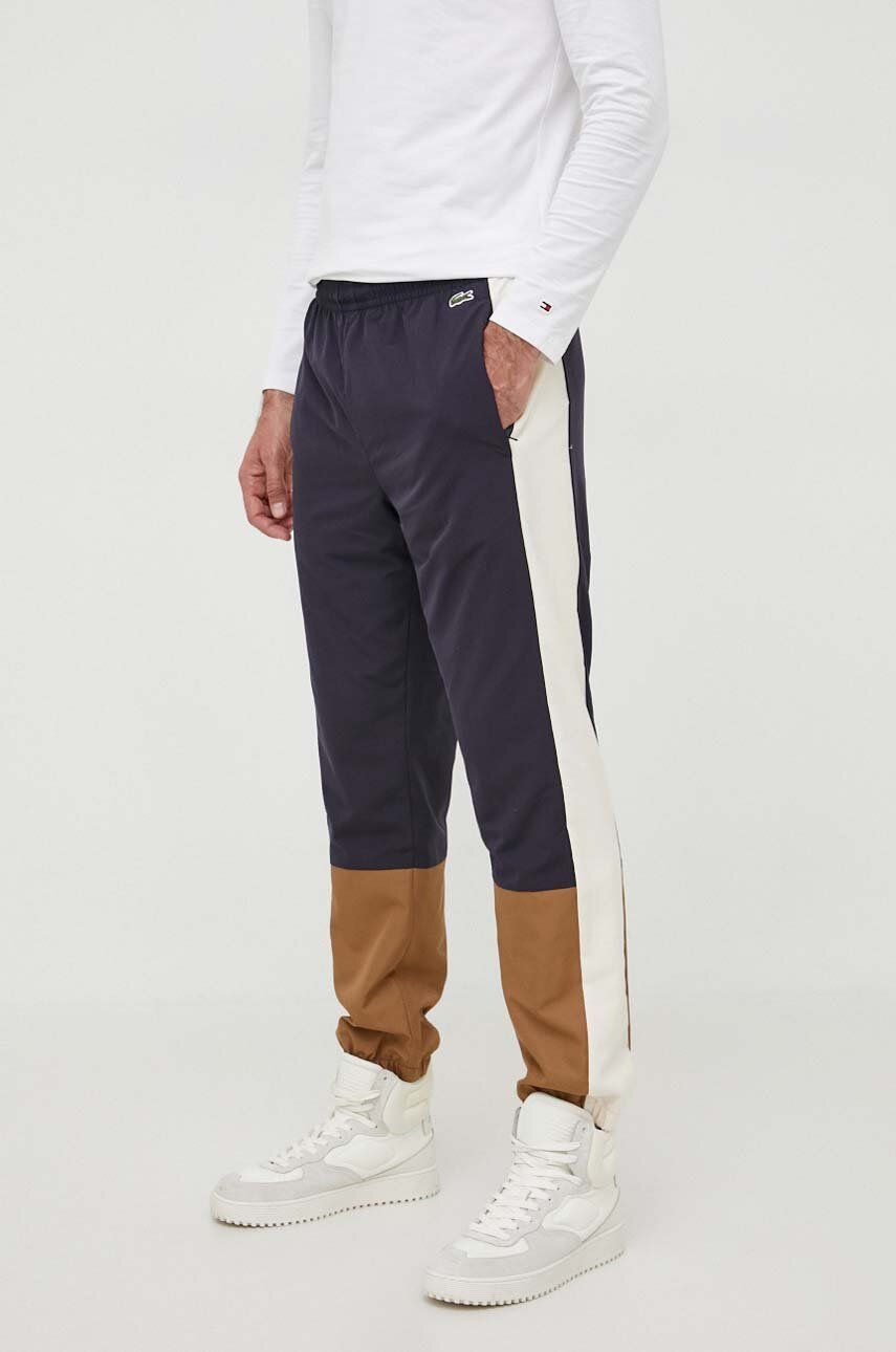 Lacoste pantaloni de trening culoarea bleumarin, cu model
