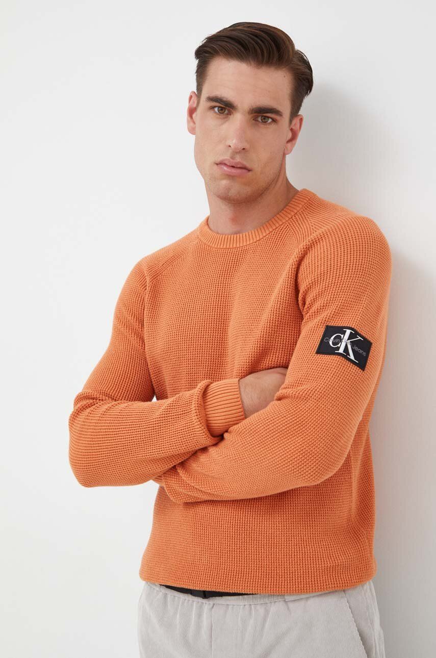 Levně Bavlněný svetr Calvin Klein Jeans oranžová barva, lehký, J30J323989