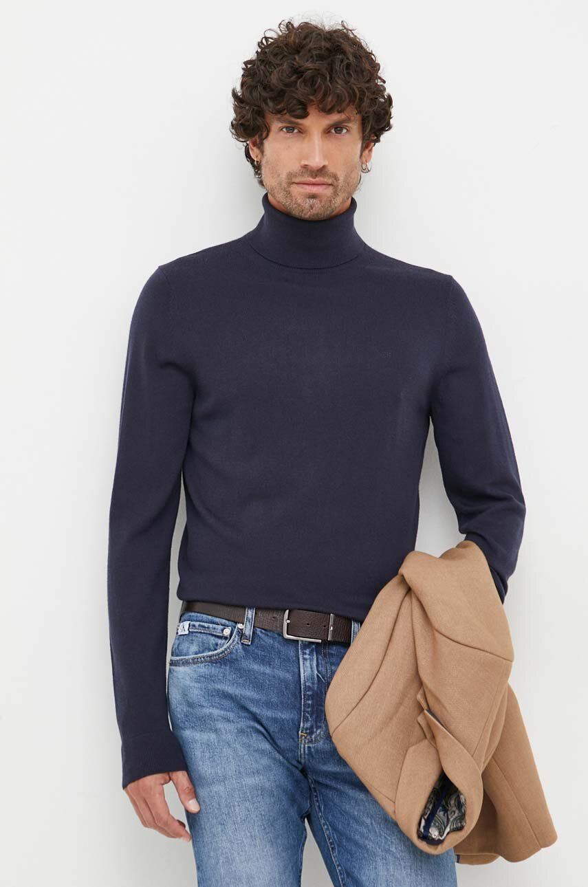 Vlněný svetr Calvin Klein pánský, tmavomodrá barva, lehký, s golfem - námořnická modř -  100 % 