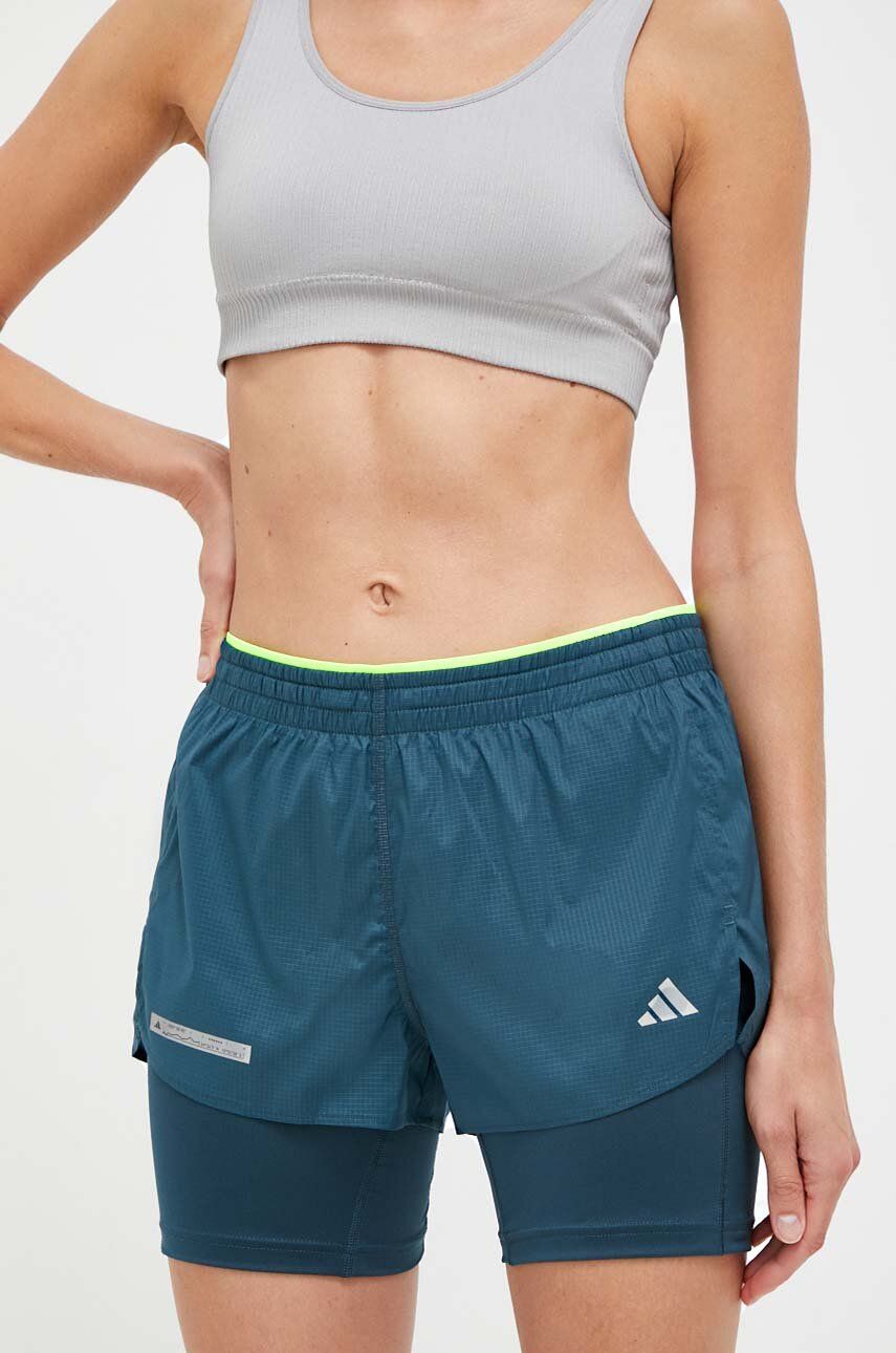 Levně Běžecké šortky adidas Performance Ultimate zelená barva, s potiskem, medium waist