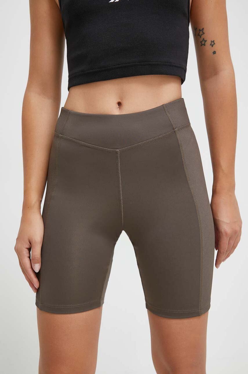 Levně Šortky na jógu Reebok zelená barva, high waist