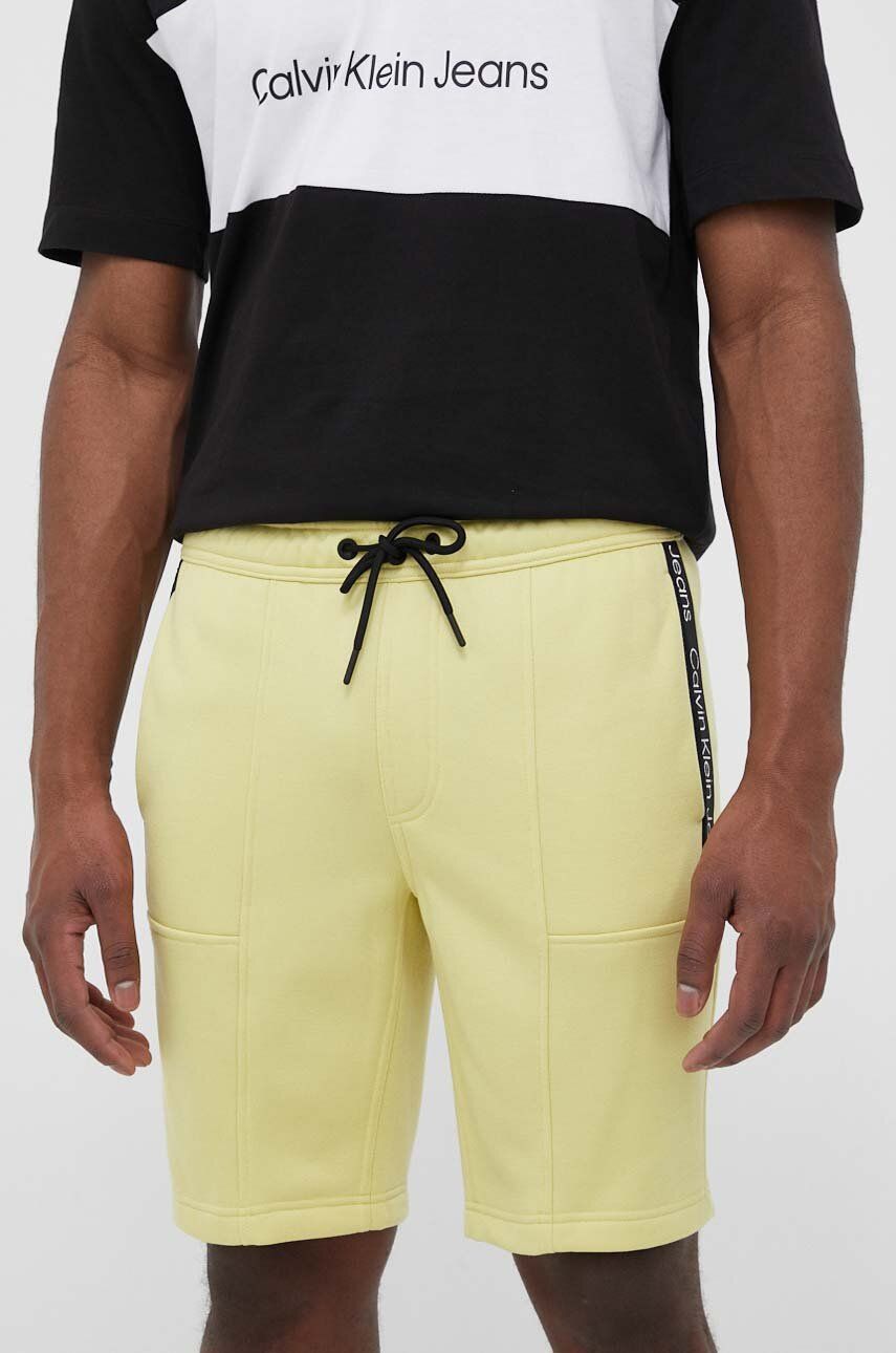 Kraťasy Calvin Klein Jeans pánské, žlutá barva - žlutá -  100 % Polyester