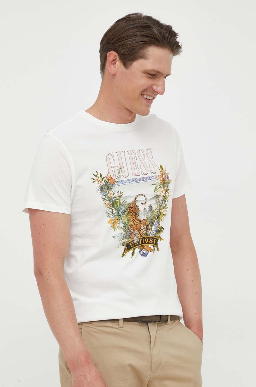 

Хлопковая футболка Guess цвет бежевый с принтом