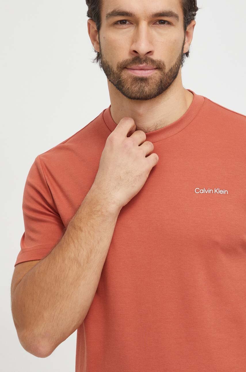 

Памучна тениска Calvin Klein в оранжево с изчистен дизайн K10K109894, Оранжев