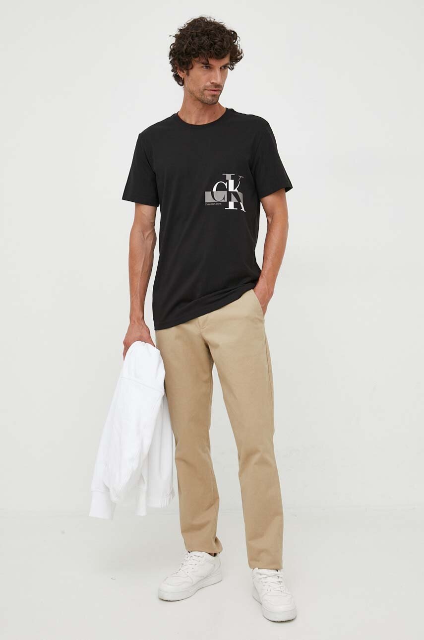 

Памучна тениска Calvin Klein Jeans в черно с принт, Черен