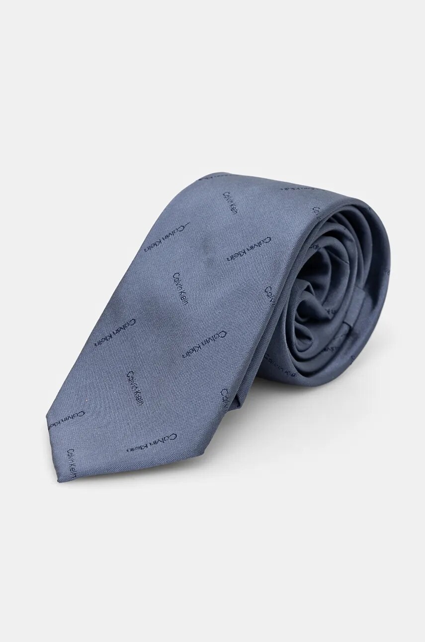 Levně Hedvábná kravata Calvin Klein modrá barva, K10K113500