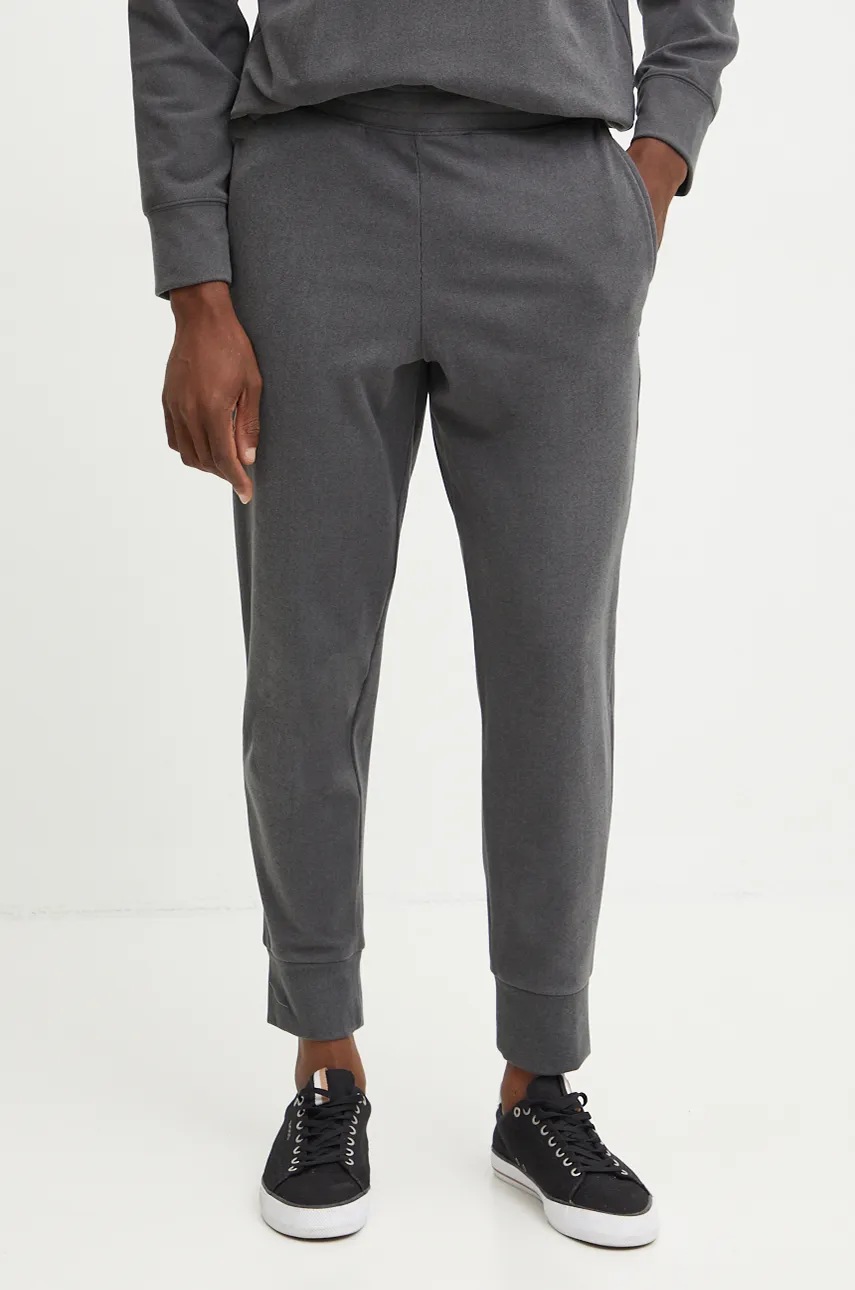 

Домашен панталон Calvin Klein Underwear в сиво с изчистен дизайн 000NM2679E, Сив
