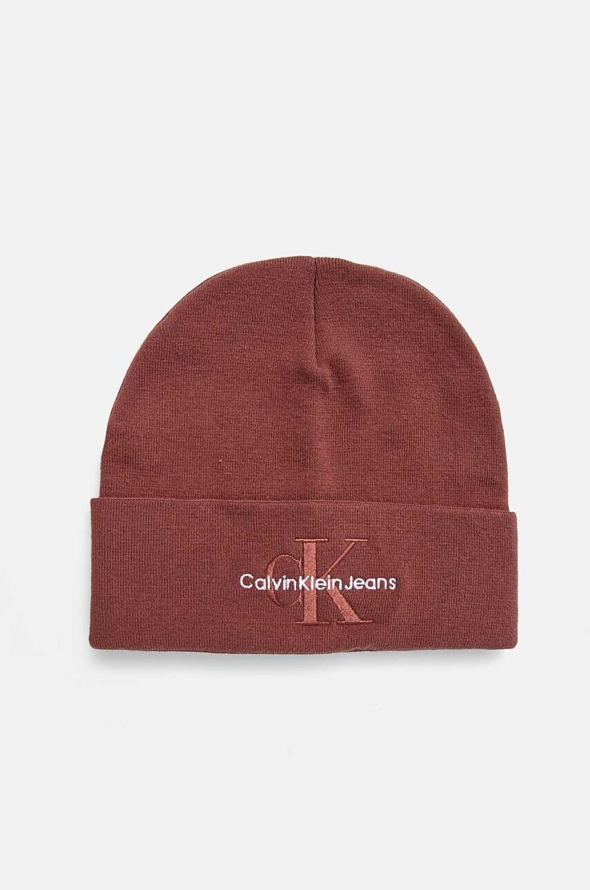 Levně Bavlněná čepice Calvin Klein Jeans červená barva, z husté pleteniny, K50K512460