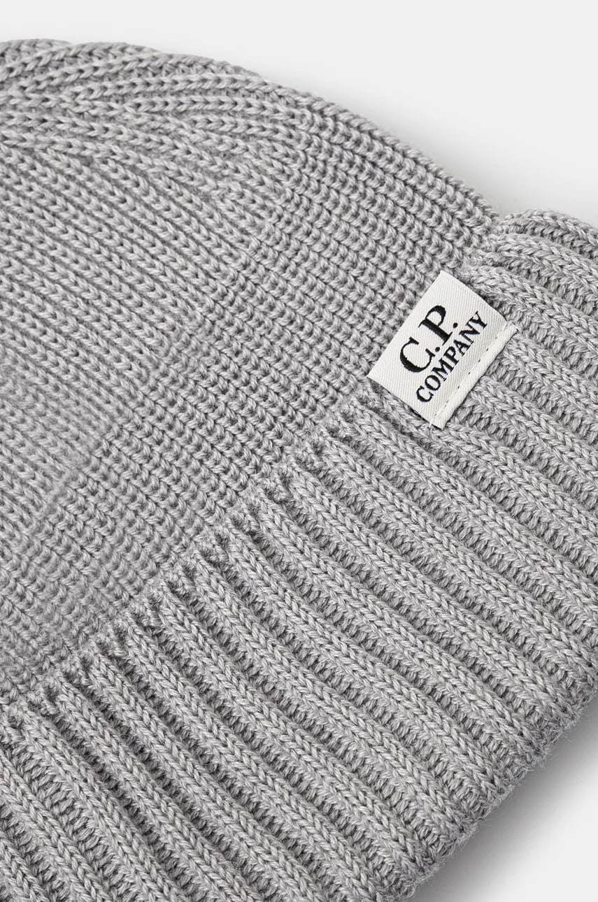 Шапка C.P. Company Knit Cap In Re-Wool цвет серый однотонная 17CMAC293A006595A Шапка C.P. Company Knit Cap In Re-Wool цвет серый однотонная 17CMAC293A006595A