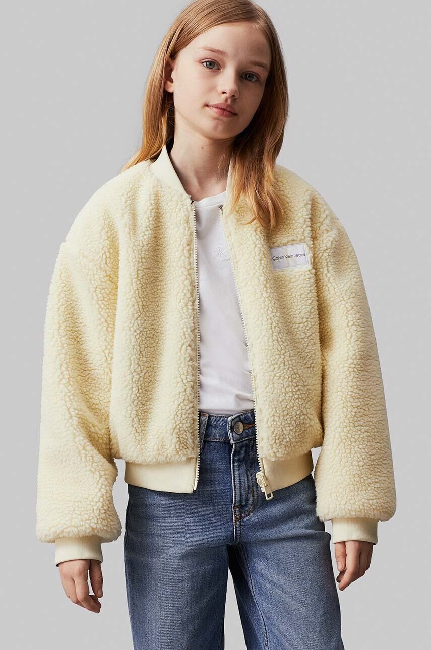 Levně Dětská oboustranná bunda Calvin Klein Jeans béžová barva, IG0IG02588