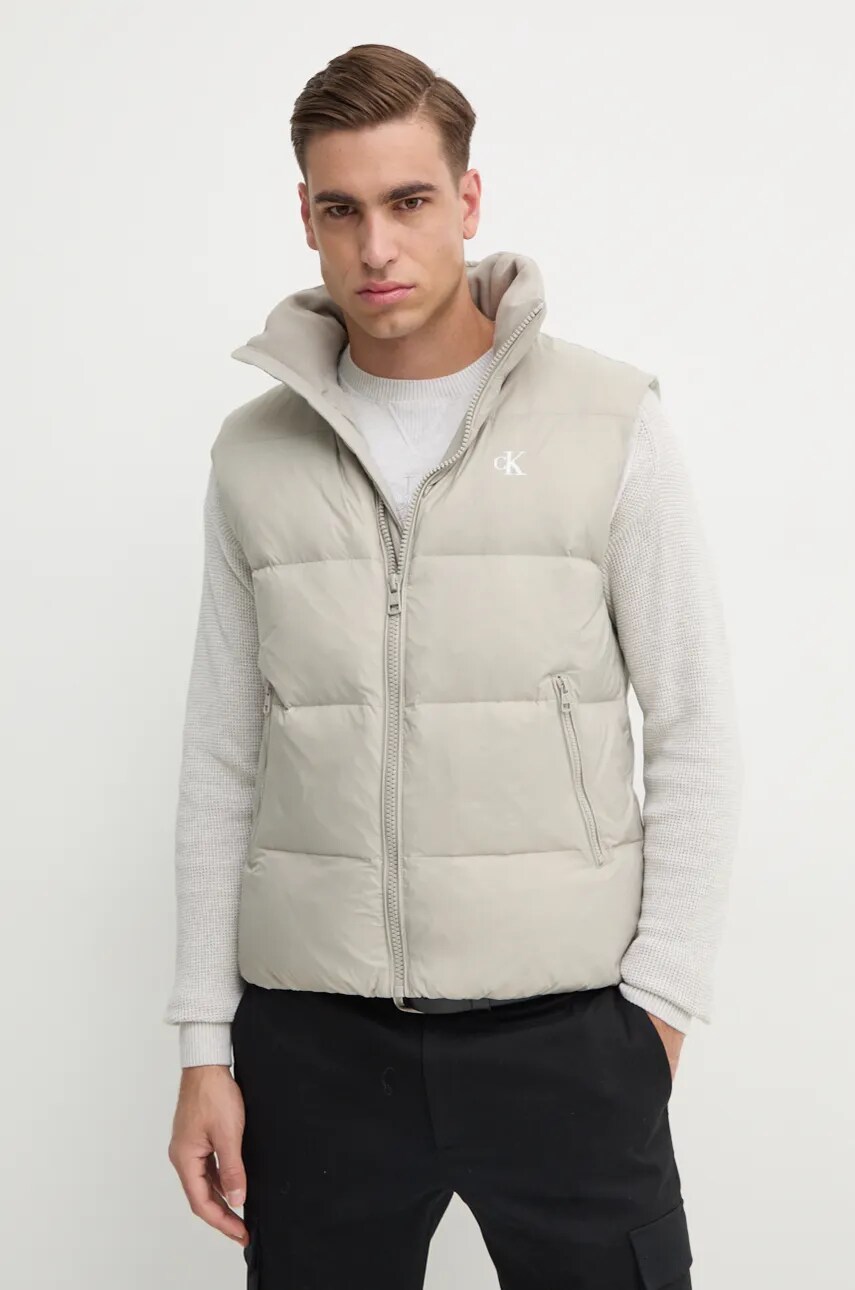 Levně Péřová vesta Calvin Klein Jeans šedá barva, J30J325901