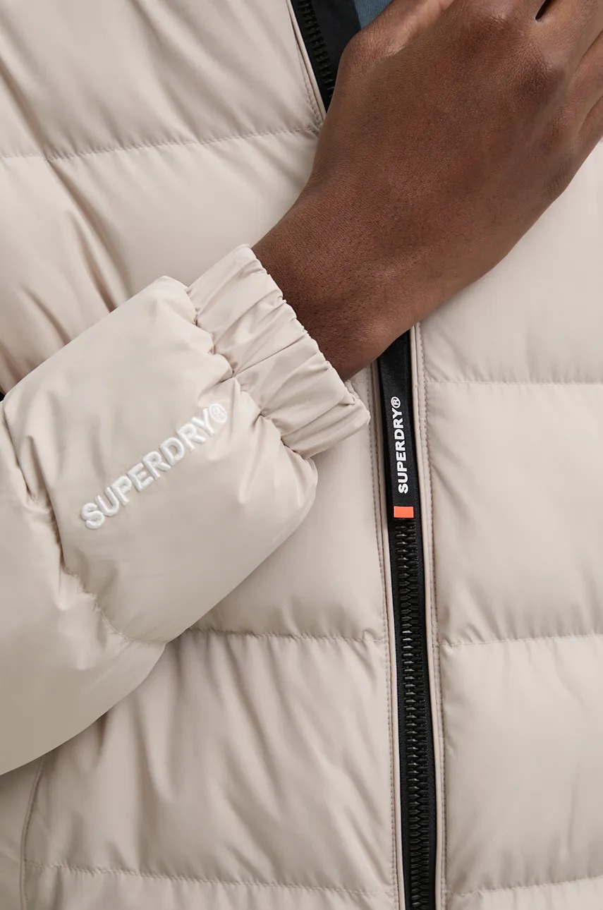 Куртка Superdry чоловіча колір бежевий зимова M5011912A-7MO 
