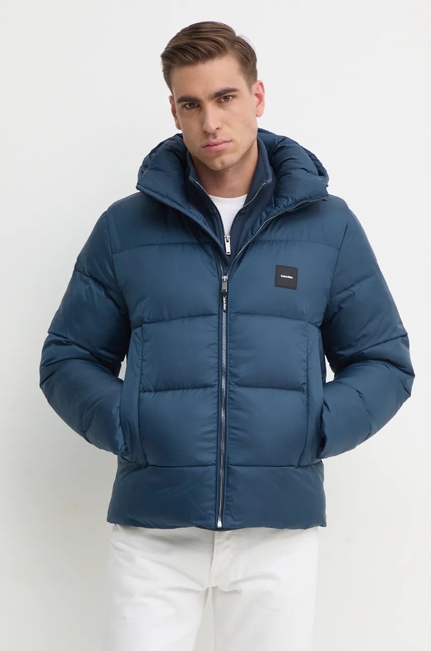 Levně Bunda Calvin Klein pánská, modrá barva, zimní, K10K113476