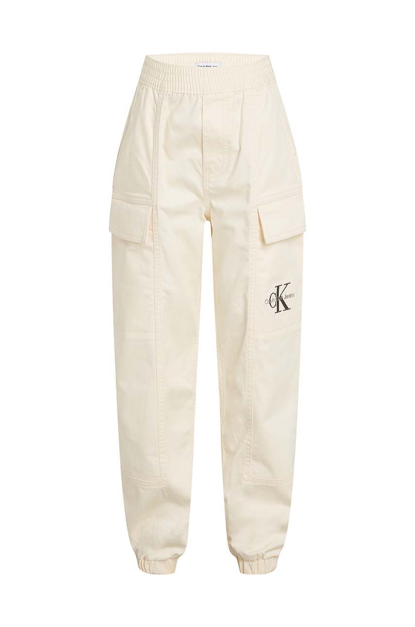 Levně Dětské tepláky Calvin Klein Jeans WOVEN CARGO béžová barva, hladké, IB0IB02270
