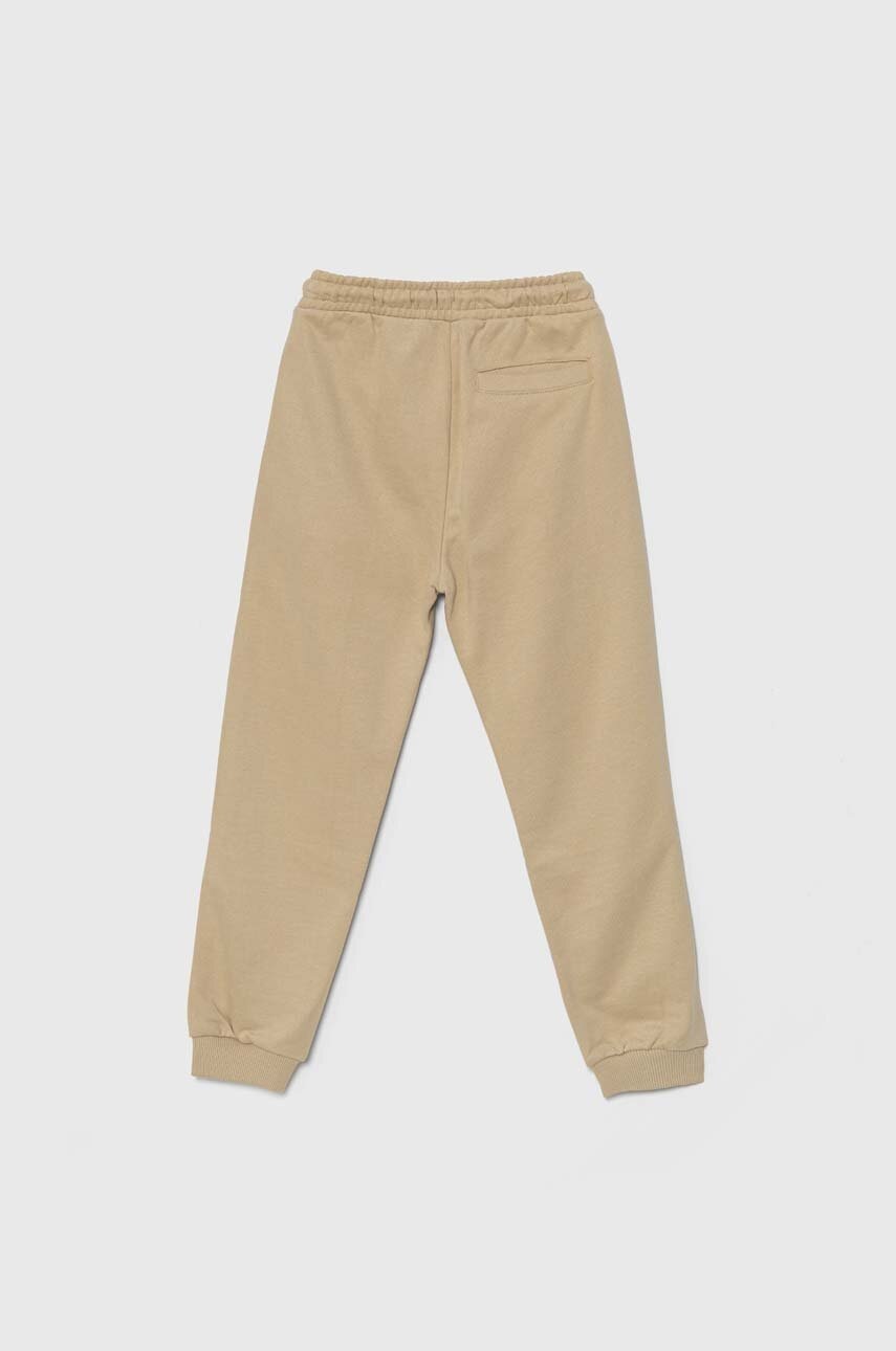 Дитячі спортивні штани Calvin Klein Jeans TERRY JOGGER колір бежевий однотонні IB0IB02119 Дитячі спортивні штани Calvin Klein Jeans TERRY JOGGER колір бежевий однотонні IB0IB02119